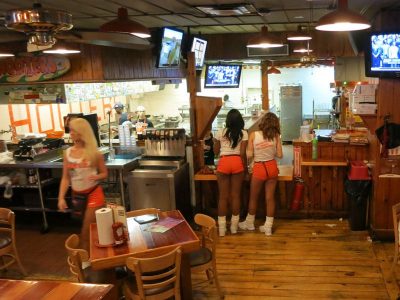 hooters unpaid overtime pay wages lawyer attorney